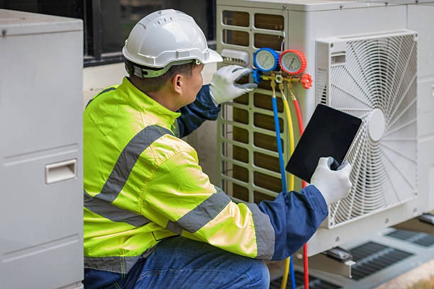 Professional Heat Pump Repair technician working in Arley, AL